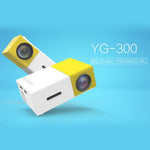 YG-300 0.8-2M 24-60 polegadas 400-600 Lumens Projetor LED HD Cinema em Casa com Cabo Conversor de Vídeo 3 em 1 e Comando à Distância, Tamanho: 12,6 x 8,6 x 4,6 cm, Ficha UE