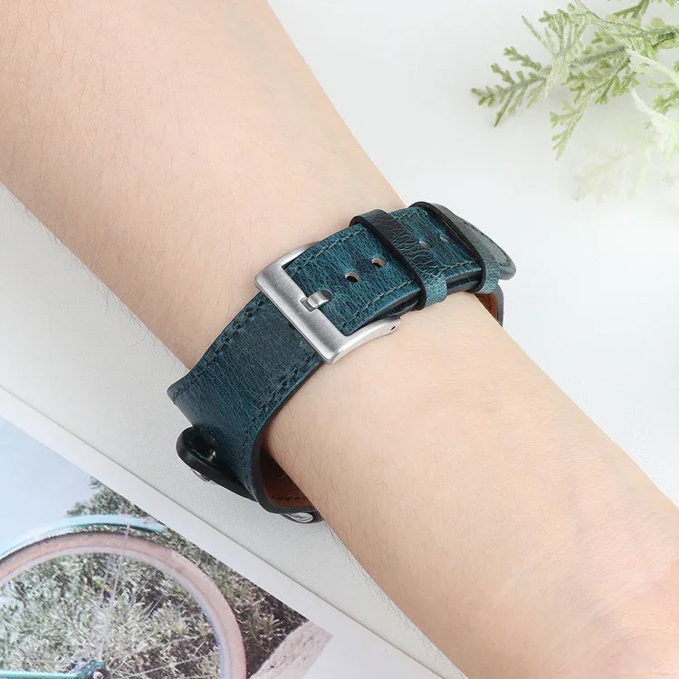 Leather replacement watchband for Apple Watch on wrist, showcasing adjustable strap and comfortable fit.