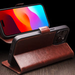 Capa para telemóvel em couro genuíno QIALINO Classic 103 com fivela, para iPhone 17e / 16e, para iPhone 17 Pro Max, para iPhone 17 Pro, para iPhone 17, para iPhone Air, para iPhone 15 Pro Max, para iPhone 15 Plus, para iPhone 15