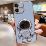 Capa para telemóvel com suporte de astronauta eletroplatinado, para iPhone 17e / 16e, para iPhone 17 Pro Max, para iPhone 17 Pro, para iPhone 17, para iPhone Air, para iPhone 16 Pro Max, para iPhone 16 Pro, para iPhone 16 Plus