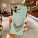 Capa para telemóvel TPU com suporte em forma de coração electroplated, para iPhone 17e / 16e, para iPhone 17 Pro Max, para iPhone 17 Pro, para iPhone 17, para iPhone Air, para iPhone 16 Pro Max, para iPhone 16 Pro, para iPhone 16 Plus