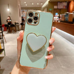Capa para telemóvel TPU com suporte em forma de coração electroplated, para iPhone 17e / 16e, para iPhone 17 Pro Max, para iPhone 17 Pro, para iPhone 17, para iPhone Air, para iPhone 16 Pro Max, para iPhone 16 Pro, para iPhone 16 Plus