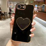 Capa para telemóvel TPU com suporte em forma de coração electroplated, para iPhone 17e / 16e, para iPhone 17 Pro Max, para iPhone 17 Pro, para iPhone 17, para iPhone Air, para iPhone 16 Pro Max, para iPhone 16 Pro, para iPhone 16 Plus