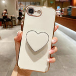 Capa para telemóvel TPU com suporte em forma de coração electroplated, para iPhone 17e / 16e, para iPhone 17 Pro Max, para iPhone 17 Pro, para iPhone 17, para iPhone Air, para iPhone 16 Pro Max, para iPhone 16 Pro, para iPhone 16 Plus