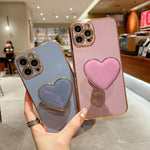 Capa para telemóvel TPU com suporte em forma de coração electroplated, para iPhone 17e / 16e, para iPhone 17 Pro Max, para iPhone 17 Pro, para iPhone 17, para iPhone Air, para iPhone 16 Pro Max, para iPhone 16 Pro, para iPhone 16 Plus